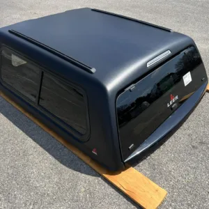 “HERE-N-READY” LEER 100XR-RXF TRUCK CAP 2019+ RAM 1500 5’7″ XB - EXTRA SHORT BED – RXF BLACK MATTE – 57DR19