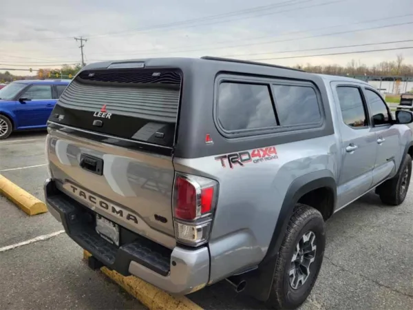 “HERE-N-READY” LEER 100XR-RXF TRUCK CAP 2016+ TOYOTA TACOMA DOUBLE CAB 5’2″ XB - EXTRA SHORT BED – RXF BLACK MATTE - 52TCDC16