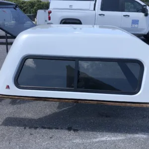 SOLD - USED LEER 180 TRUCK CAP 2014 CHEVROLET 1500 CREW CAB EXTRA SHORT BED PEARL WHITE - 21982563 - SOLD