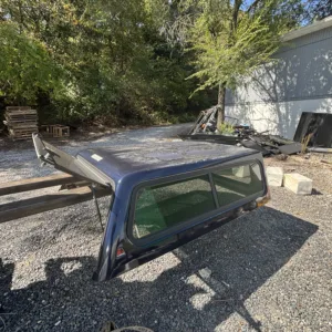 USED LEER 100R TRUCK CAP 2009 DODGE RAM 1500 SHORT BED 6'4" BLUE - 2330380