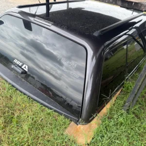 USED ARE CX REVO FIBERGLASS TRUCK CAP - 2020 RAM 2500 CREW CAB SHORT BED - BLACK - N4768398.1